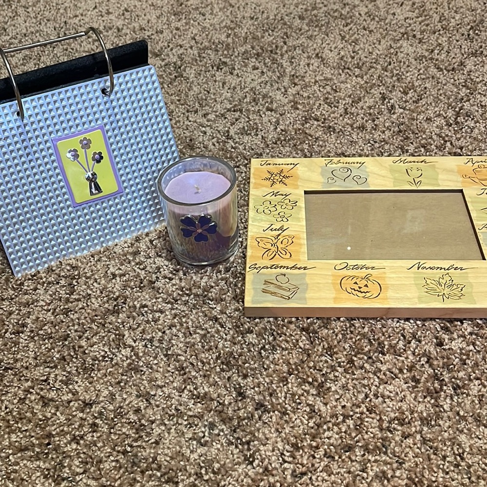 Picture book, frame and new candle.